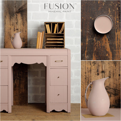 Fusion Mineral Paint Damask sample and matte pitcher displayed next to books on wood and brick surfaces.