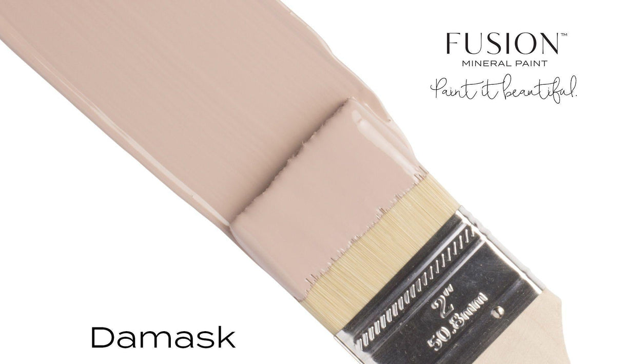 Damask Fusion Mineral Paint jar by Fusion Mineral Paint with a paintbrush, displayed on a white background.