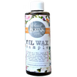 Bottle labeled Dark Oil Wax by Sweet Pickins with instructions, natural wood finish from Old Fashioned Milk Paint.
