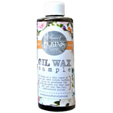 Bottle labeled Dark Oil Wax by Sweet Pickins with instructions, natural wood finish from Old Fashioned Milk Paint.