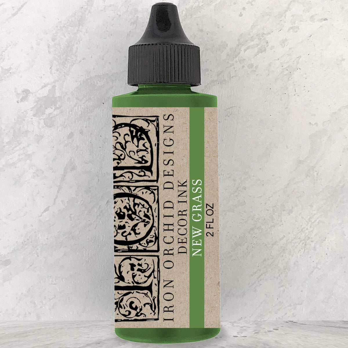 2 fl oz Decor Ink by IOD in New Grass with black dropper cap, pigment-rich formula, labeled by I.O.D.
