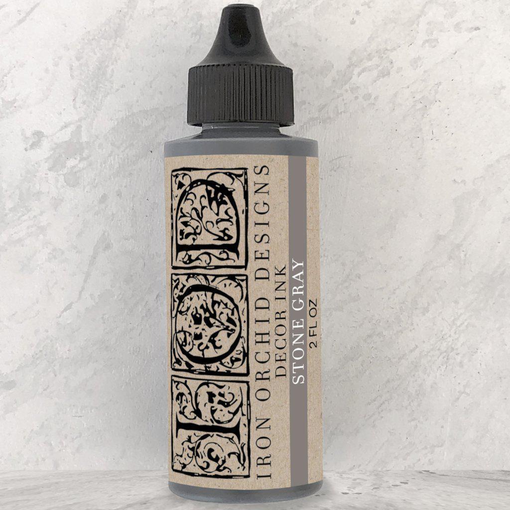I.O.D. Decor Ink, Stone Gray, 2 fl. oz. bottle with black twist cap.