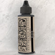 I.O.D. Decor Ink, 2 fl oz bottle, black pigment-rich formula with ornate beige and black label by Iron Orchid Designs.
