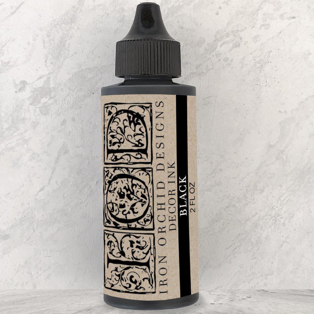 I.O.D. Decor Ink, 2 fl oz bottle, black pigment-rich formula with ornate beige and black label by Iron Orchid Designs.