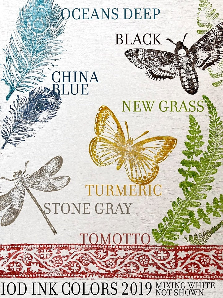I.O.D. Decor Ink colors Oceans Deep, China Blue, Tomotto, and others shown with feather and insect motifs.