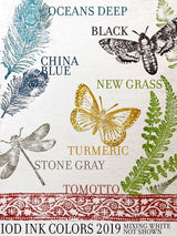 I.O.D. Decor Ink colors Oceans Deep, China Blue, Tomotto, and others shown with feather and insect motifs.