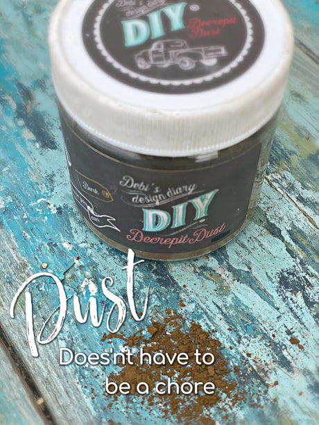DIY Paint Co. Decrepit Dust container shown on a blue wooden surface.