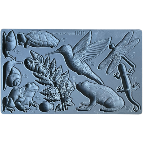 I.O.D. Dewdrop Pond Mould with pond animals, insects, plants, and cavity measurement markings.