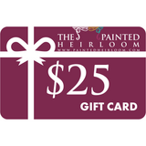 The Painted Heirloom $25 Digital eGift Card with white ribbon on maroon background.