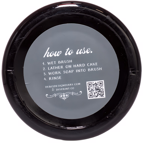 DIY Paint Co. Brush Cleaner lid with wet, lather, rinse instructions and QR code for more details.