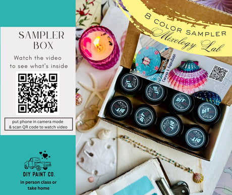 DIY Paint Co. Mixology Lab 8-Color Sampler Box with paint jars, pink candle, art set, and QR code for painting video.
