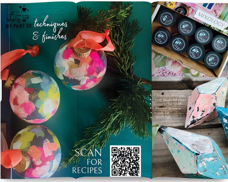 DIY Mixology Lab Paint 8-Color Sampler Box by DIY Paint Co. with geometric objects on a teal surface.