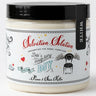 A jar of Primers & Skin Killer DIY 'Salvation Solution' white pigment, featuring a black lid and a white label with red and blue text and illustrations.