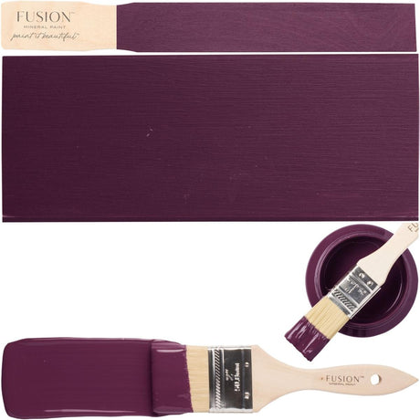Brush with Elderberry Fusion Mineral Paint resting on can, showing matte paint swatches.