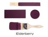 Fusion Mineral Paint Elderberry shown as a deep purple matte swatch, brush, and wood sample.