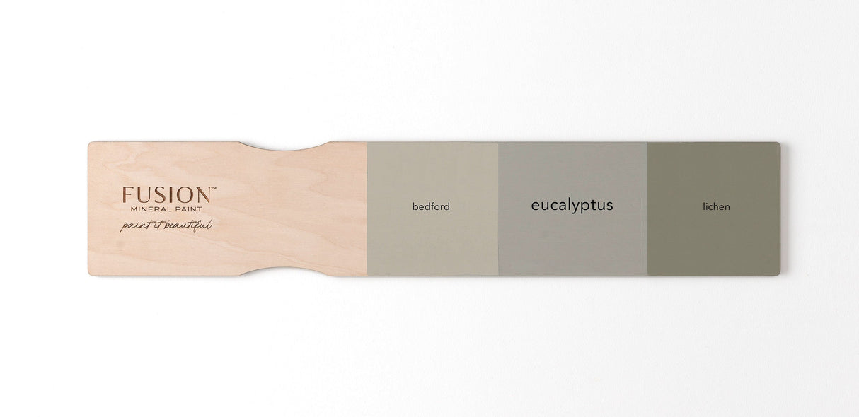Three Fusion Mineral Paint swatches: Bedford, Lichen, and Eucalyptus displayed on a wood board.