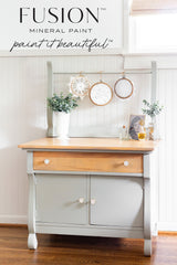 Cabinet beneath Fusion Mineral Paint sign featuring Eucalyptus Fusion Mineral Paint.