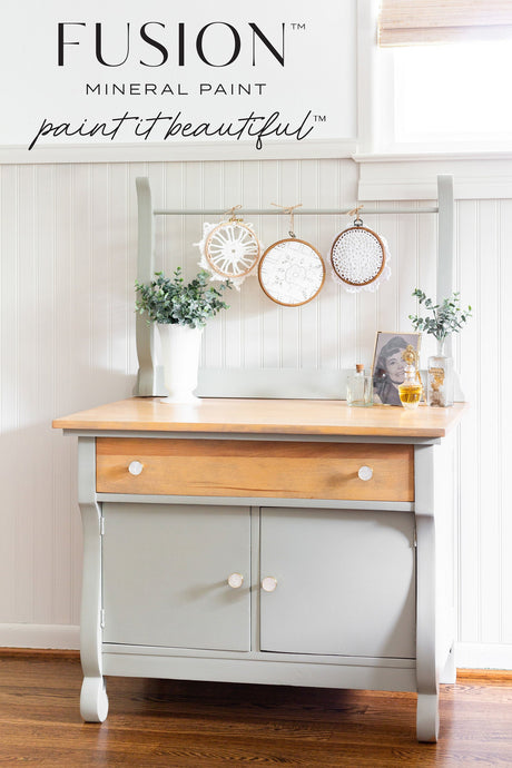Cabinet beneath Fusion Mineral Paint sign featuring Eucalyptus Fusion Mineral Paint.
