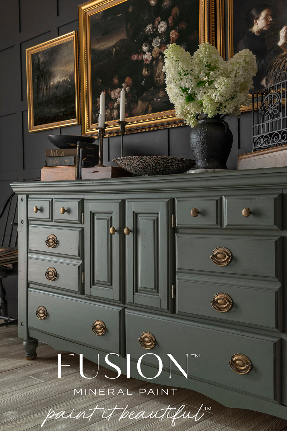 Everett sideboard painted with Everett by Fusion Mineral Paint, brass handles, topped with flowers and art above.