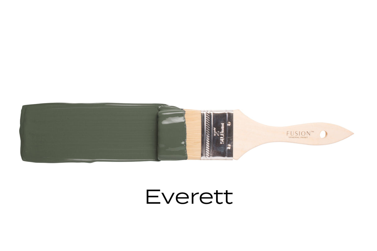 Paintbrush with olive green Everett Fusion Mineral Paint.