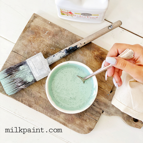 Hand stirring Old Fashioned Milk Paint with Extra Bond by Sweet Pickins.