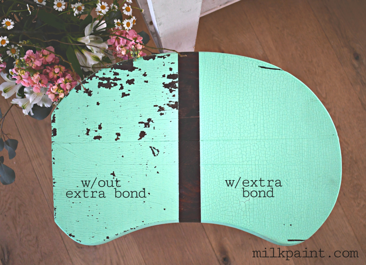 Two wood pieces: left chipped, right smooth, labeled Extra Bond by Sweet Pickins Old Fashioned Milk Paint.