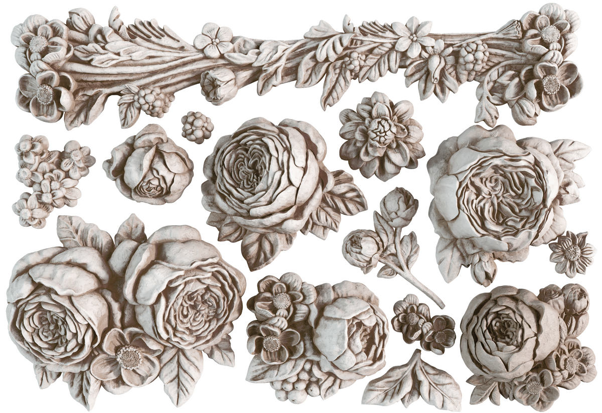 Felicite Mould by IOD with flower and leaf carvings on white background.