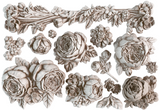 Felicite Mould by IOD with flower and leaf carvings on white background.