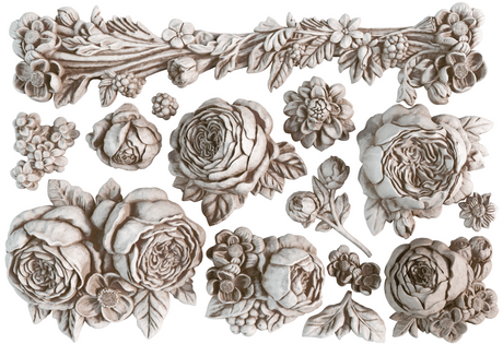 Felicite Mould by IOD with flower and leaf carvings on white background.