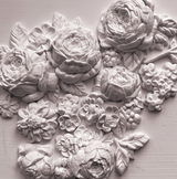 Felicite Mould by IOD featuring raised floral carvings in a light monochrome style for flat surfaces.