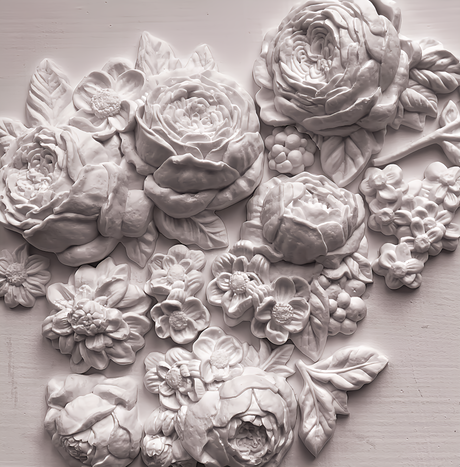 Felicite Mould by IOD featuring raised floral carvings in a light monochrome style for flat surfaces.