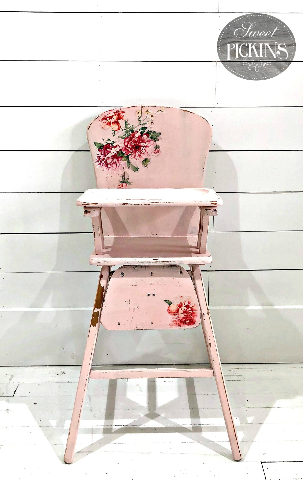 Pink wooden high chair painted with Old Fashioned Milk Paint in First Crush color.