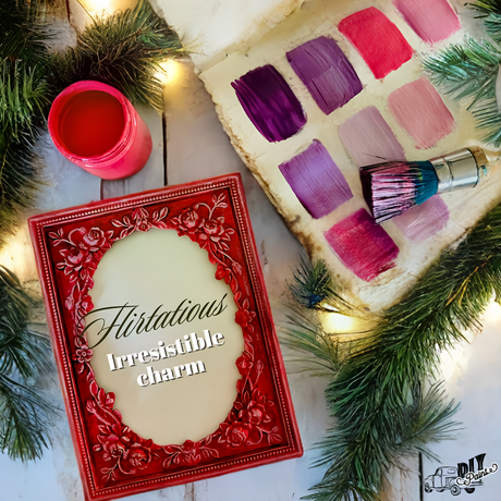 Flirtatious DIY Paint Co. red book, paintbrush, and furniture paint swatches on white background.
