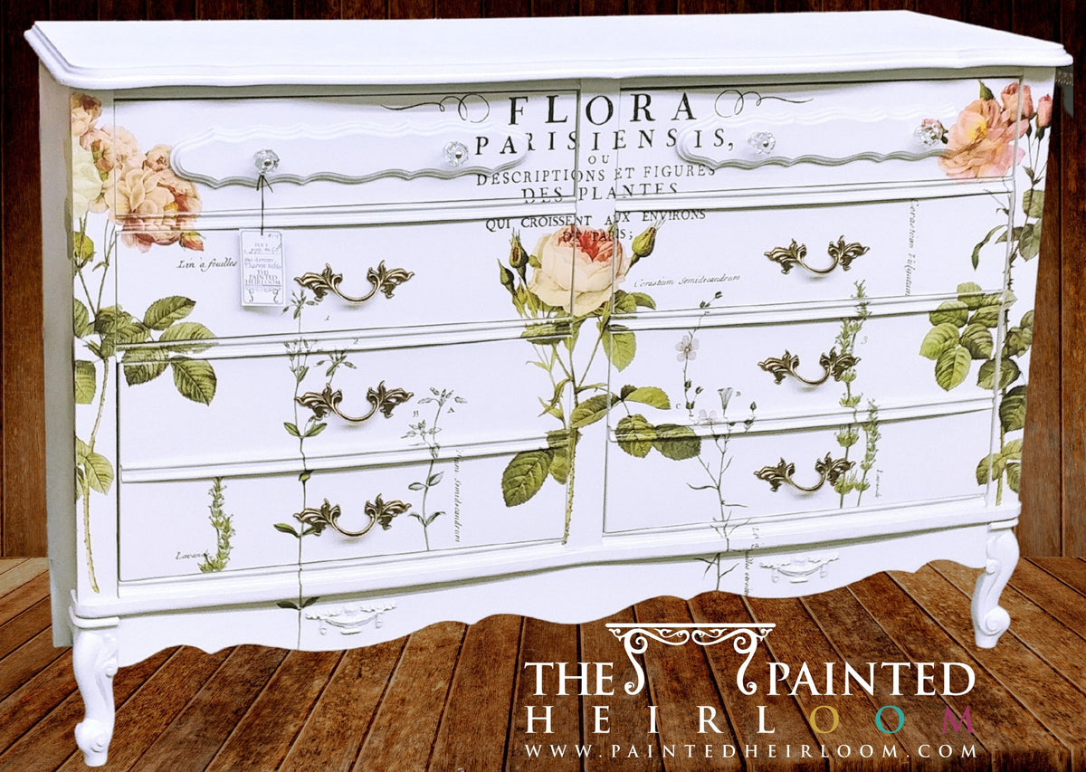 White vintage dresser with I.O.D. Flora Parisiensis Decor Transfer and ornate handles.