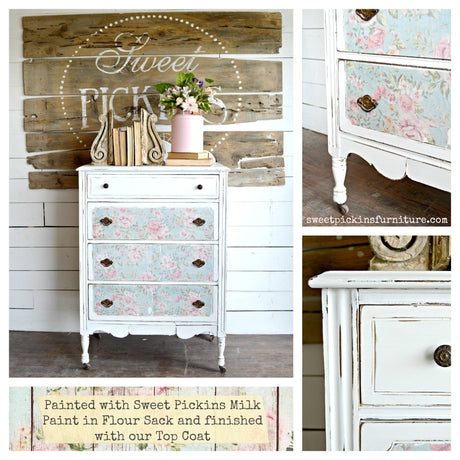 White vintage dresser painted Flour Sack by Old Fashioned Milk Paint, floral drawers, brass handles, decor on top.