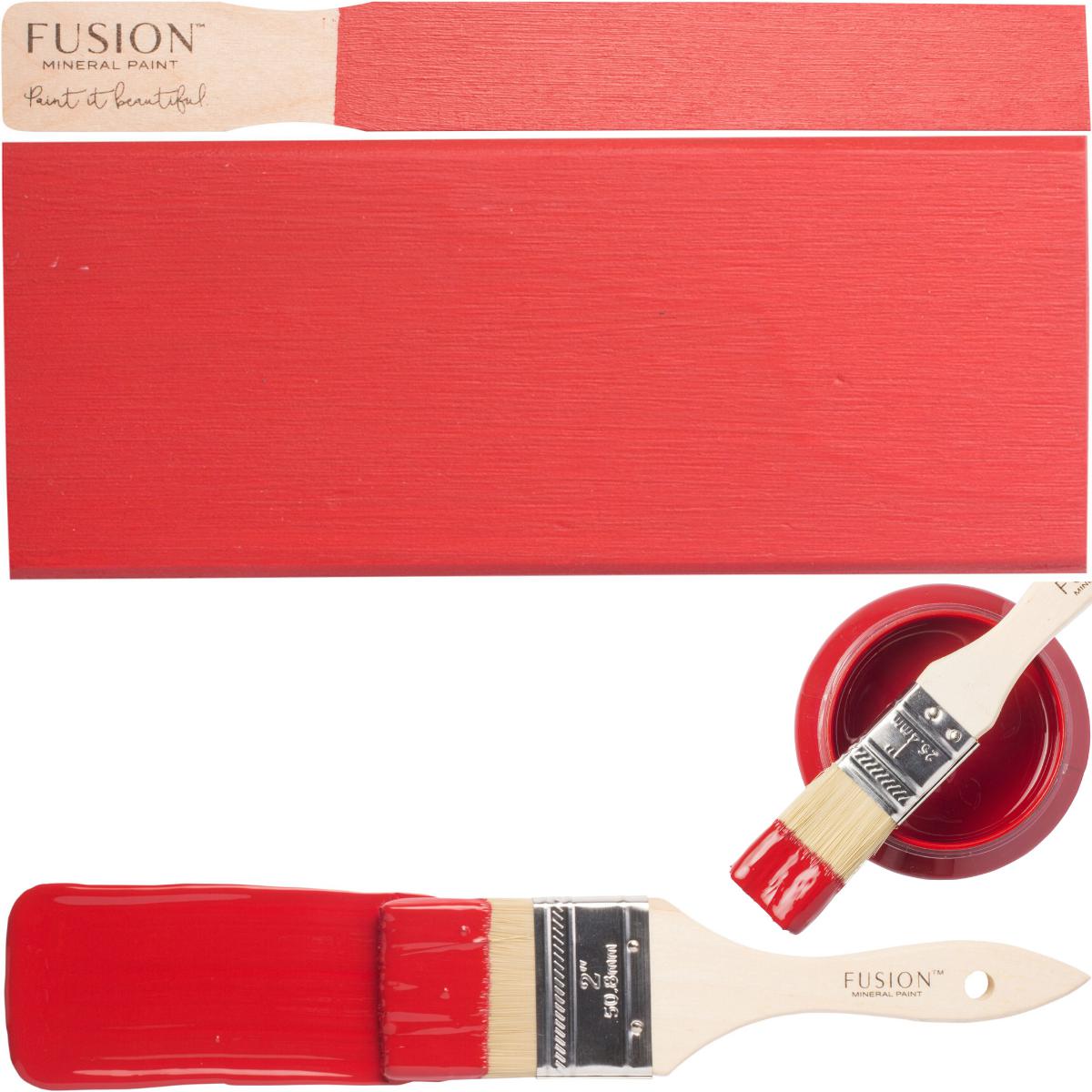 Paintbrush, red board, and Fusion Mineral Paint Fort York Red all-in-one acrylic paint tube.