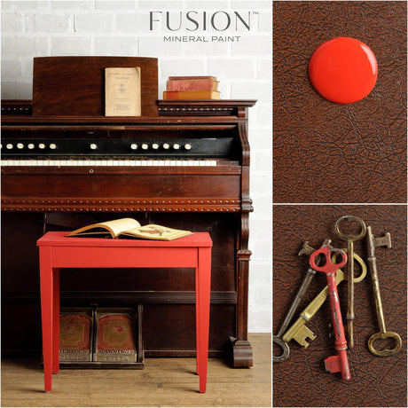 Table in Fort York Red by Fusion Mineral Paint with antique keys on its brown textured top.