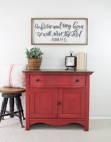 Fort York Red Milk Paint cabinet by Homestead House with clock, books, and plant on top.