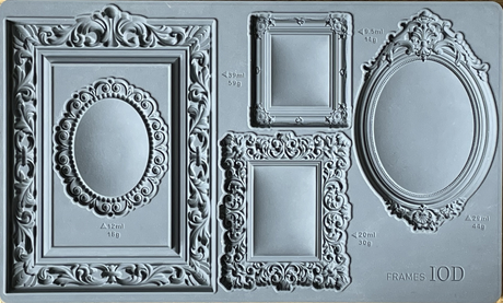 Gray silicone IOD Frames Mould with 5 ornate frame designs, each marked with volume measurements.