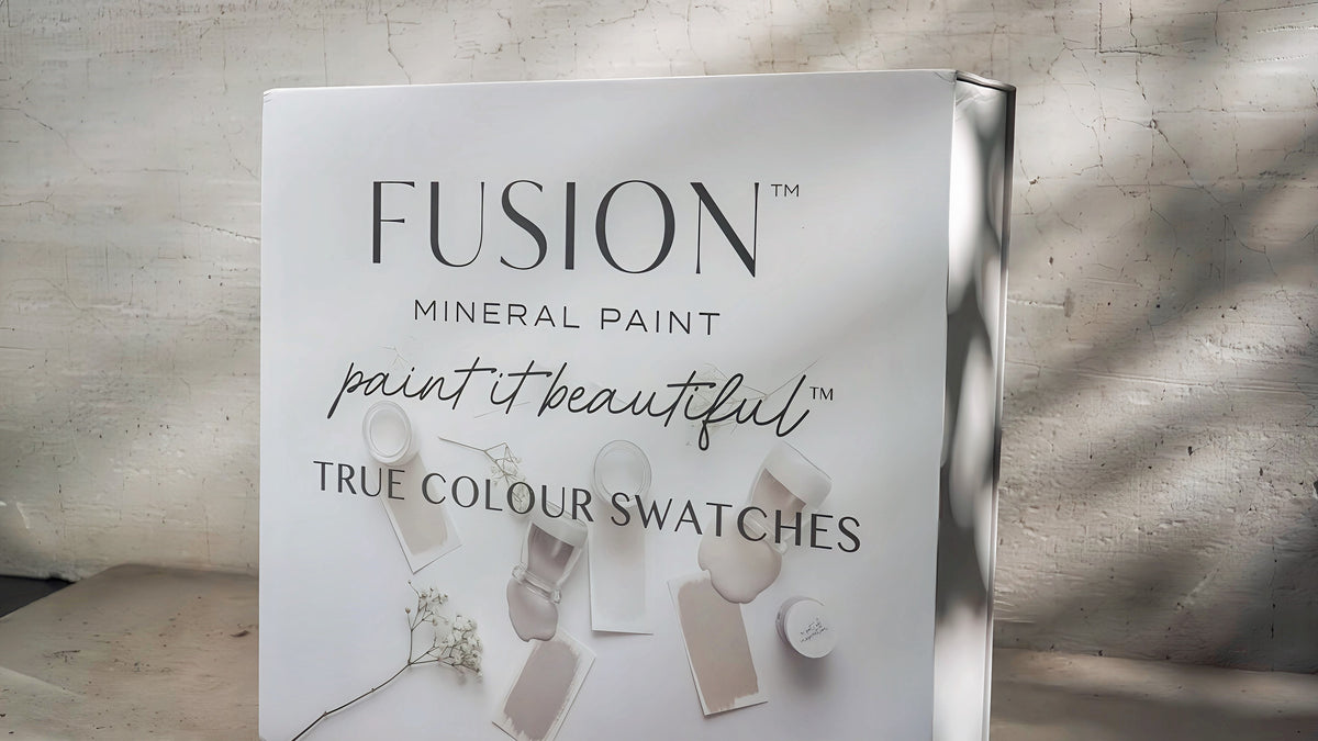 Fusion Briefcase Swatch Box Set by Fusion Mineral Paint displaying paint color swatches on a flat surface.