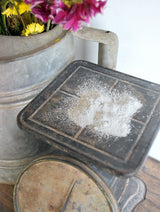 Galvanized – Sweet Pickins Milk Paint by Old Fashioned Milk Paint displayed on a vintage metal scale with flowers nearby.