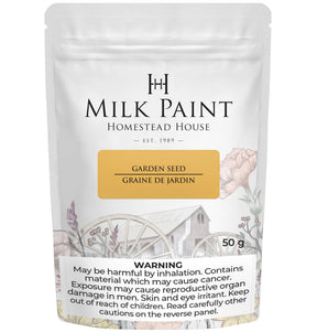 Garden Seed Milk Paint by Homestead House, 50g jar with health warning and floral art on white background.