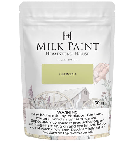 50g Gatineau Milk Paint by Homestead House pouch with floral, wagon art, and warning labels on the packaging.