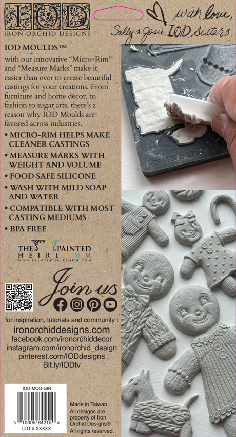 Hand pressing IOD Ginger & Spice Mould (2023) into clay to create detailed gingerbread-shaped impressions.