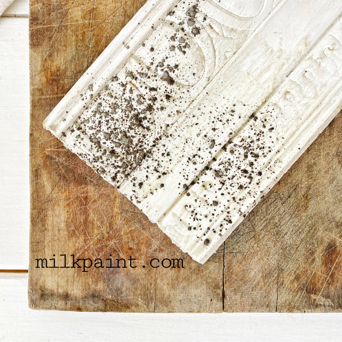 White trim with Sweet Pickins Grit Aging Dust beside Old Fashioned Milk Paint and milkpaint.com branding.