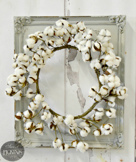 Cotton wreath displayed against wall painted with Old Fashioned Milk Paint’s Haberdash – Sweet Pickins Milk Paint.