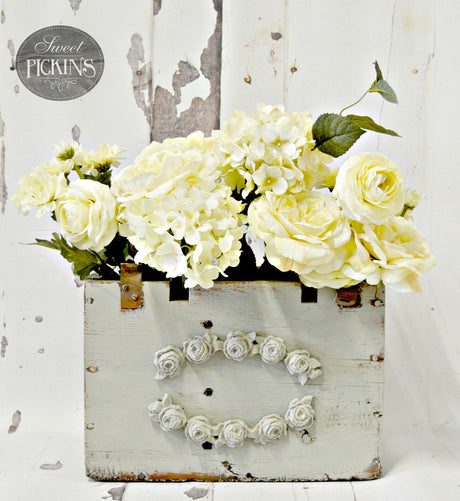 White wooden box with faux flowers, painted in Old Fashioned Milk Paint – Haberdash.