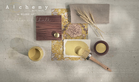 Wood sample, yellow floral tile, fabric swatch, and Fusion Mineral Paint Harvest arranged on a gray background.