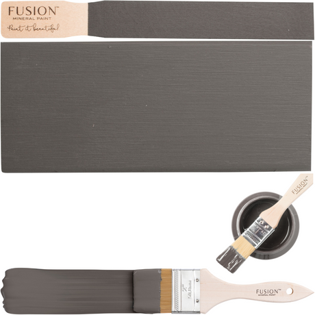 Brush, wood sample, and can of Hazelwood Fusion Mineral Paint by Fusion in rich grey shade.