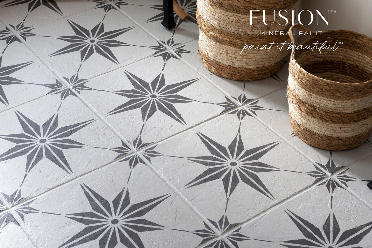 White tile floor with black star pattern, woven baskets, Fusion Mineral Paint “Hazelwood” text at top right.